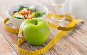 Properly formulated diet is one of the key points of weight loss. To get rid of extra pounds, to gain a slim and fit silhouette, you must strictly calculate the number of calories consumed per day, bring physical activity into your daily plan and, of course, discard harmful products that trigger fat accumulation. And if there is no doubt about fast food and other “hazards”, then sweets are often mistakenly attributed to the list of dishes prohibited during weight loss. In fact, a competent diet can be even tastier than a standard diet, the main thing is to choose low-calorie dietary desserts that will not leave behind a couple of extra inches at the waist. TOP-5 store desserts for losing weight On the shelves of modern stores you can find absolutely any sweets, including low-calorie. The list of the most useful and tasty dietary products includes: 1. Dark chocolate Unlike milk chocolate, confectionery tiles and desserts with the addition of fillings and dried fruit, natural dark chocolate with a minimum sugar content and a high percentage of cocoa beans is considered one of the most healthy and low-calorie foods during weight loss. The nutritional value of such sweetness will quickly quench the feeling of hunger, and the microelements that are part of it will fill the body with energy for the whole day. In addition, dark chocolate stimulates the production of serotonin - a hormone that reduces stress and causes a feeling of satisfaction, which, in turn, inhibits cravings for harmful high-calorie sweets. According to the recommendations of nutritionists, you can eat about 2-3 strips from a standard 100 gram tile per day, and this will in no way damage the figure. 2. Low-fat ice cream Favorite summer sweetness is also allowed to be consumed during the diet, but it should be chosen wisely: low-calorie types include only ice cream, which has no fillers and other additives, and the fat content is minimal. If desired, you can cook it yourself, choosing non-fat milk and replacing part of the sugar with berries and fruits. This dessert is rich in calcium, so it quickly quenches hunger and compensates for the lack of nutrients. Another important point is the low temperature of milky sweetness: getting into the stomach, cold causes a reduction in blood vessels, thereby stimulating heat transfer. This process causes additional energy consumption for warming the body from the inside, so splitting calories is faster. Despite the fact that low-fat dairy ice cream belongs to low-calorie desserts, pampering yourself with such sweetness without the risk of gaining an extra couple of kilograms can be no more than 2 times a week - even the most dietary varieties, if consumed in excess, can cause ineffective diet. 3. Candied Dried fruits can, without harm to the figure, fully compensate for the craving for sweets. They can be used as an afternoon snack in a standard form, added to porridges and compotes, or soaked overnight in water in order to enjoy a hearty and healthy breakfast in the morning. Candied fruits contain a high percentage of cellulose, which is slowly digested, therefore, it quenches hunger for a long time. In addition, dried fruits are rich in complex carbohydrates necessary for proper energy exchange. During the period of weight loss, they will provide the body with calories that are not deposited in the adipose tissue, and also bring healthy vitamins and trace elements into the diet. Choosing dried fruits, you should pay attention to the method of drying them. It is better if all fruits are dried naturally without the use of sugar and preservatives - only in this case, the sweetness will be considered low-calorie. In addition, you should observe a sense of proportion - it is better to eat no more than 3-4 pieces of prunes and figs per day, 100 grams of dried apples and pears. 4. Marshmallow Natural marshmallows, cooked without preservatives, can be attributed to low-calorie sweets with a small reservation - it should be included in the menu carefully and moderately. Dietary marshmallow consists of chicken egg proteins, sugar substitutes and gelatin. If desired, you can cook it yourself - so the sweetness will turn out not only low-calorie, but also guaranteed fresh, natural and incredibly tasty. But sugar can be replaced with maple syrup or berries - the taste will not suffer from this, and the caloric content will noticeably decrease. One option for homemade marshmallow is peach-based sweetness. For its preparation you will need: 3 ripe juicy peaches; 15 grams of instant gelatin; any sweetener. Wash peaches thoroughly, peel and chop in a blender to a smooth mash. Gelatin dissolve in a small amount of water, mix it with peach puree and sweeten a little. Cool the resulting mass, then thoroughly whisk with a mixer, lay on the parchment, forming neat marshmallows, and leave for a couple of hours until fully cured. Such sweetness will turn out to be no worse than shopping, and the low-calorie composition will allow you to pamper yourself with a homemade dessert 2-3 times a week, even while dieting. 5. Fruit jelly Jelly, prepared on the basis of natural fruit juice, can be safely counted among the low-calorie and incredibly tasty sweets, which are well refreshed, satisfy hunger and compensate for vitamin deficiencies. Such desserts are sold in small portioned jars, which can be an excellent option for snack or snack. The main thing is to ensure that there is no sugar in the composition, or its amount is minimal. In this case, jelly is allowed on a diet in unlimited quantities. However, it is not necessary to overpay for the finished product - you can easily make several servings of fresh fruit jelly based on your favorite fresh juice or make a fruit mix of several types of juice, gelled in layers. Anyway, home sweetness will be much tastier and healthier shopping. Fruits and berries - the best source of sugar Of course, the most low-calorie sweetness allowed during weight loss are fruits and berries. However, it is not necessary to assume that any types of natural products are allowed on the diet - some of them contain a rather high percentage of glucose, which will reduce the effectiveness and speed of weight loss. Without fear of gaining extra pair of kilos you can use: citrus fruits, especially grapefruits, a pineapple; watermelon, red currants, kiwi, blueberries mango, raspberries, strawberries green apples sour varieties. But from the grapes during weight loss is better to give up - even sour berries contain a large number of calories. In addition, the dense skins are digested for a long time, littering the stomach. You should also reduce the portions of persimmon and bananas - although they are rich in vitamins and trace elements, but extremely calorie. Recommendations for eating sweets while losing weight Making the diet menu, you should pay attention not only to the choice of low-calorie sweets, but also to their correct use: If you want to sweeten your own diet, not only follow the number of calories contained in the dessert, but also the percentage of fat: you can get rid of the calories eaten with the help of an extra workout, and it is not so easy to break down lipids from sweets. It is from them that the subcutaneous fat layer and the inner fat are formed, covering the organs with a thick layer. Even the lowest calorie sweetness, eaten for dinner, will definitely affect the scales. During sleep, the body does not require additional calories, since all processes slow down, so the dessert is simply deposited on the waist and sides with extra centimeters. Eating goodies is possible only before lunch - so the body will receive additional energy, and the resulting calories will be completely consumed during the day. And if in the evening unbearably want to feast on something sweet, it is better to satisfy your hunger with fragrant herbal tea with a spoon of honey. Including low-calorie sweets in the menu, make sure that their energy value does not exceed 10% of the daily norm. Avoid artificial sweeteners - they do not replace sugar, but, on the contrary, increase cravings for delicacies. It is better to use natural products - sweet berries, fruits, candied fruits. In extreme cases, you can replace sugar with honey - although its energy value is quite high, honey is much sweeter than standard sugar, therefore it is much less expensive. Do not indulge yourself with desserts every day - while dieting, you can do relaxation 2-3 times a week. And if you really want something tasty, you can eat a couple of slices of bitter chocolate - it will fill the shortage of necessary substances and will not affect excess weight. In no case do not include in the diet yeast pastries and butter creams - even with a stretch it is impossible to call them low-calorie. Such sweetness inhibits metabolism, disrupts the digestive tract and, moreover, contains an inadmissibly high percentage of lipids. If you decide to eat homemade cakes, choose recipes based on flax flour - there are much fewer calories in it than in wheat flour, and the fiber contained in it will provide nutritional value and reduce hunger. List of the most low-calorie sweets