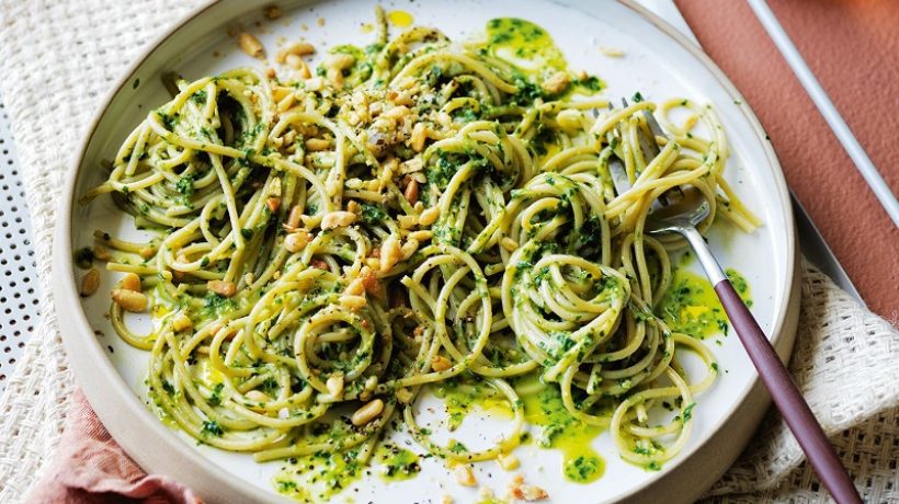 Cold pasta with fresh rocket pesto, cherry tomatoes and pine nuts